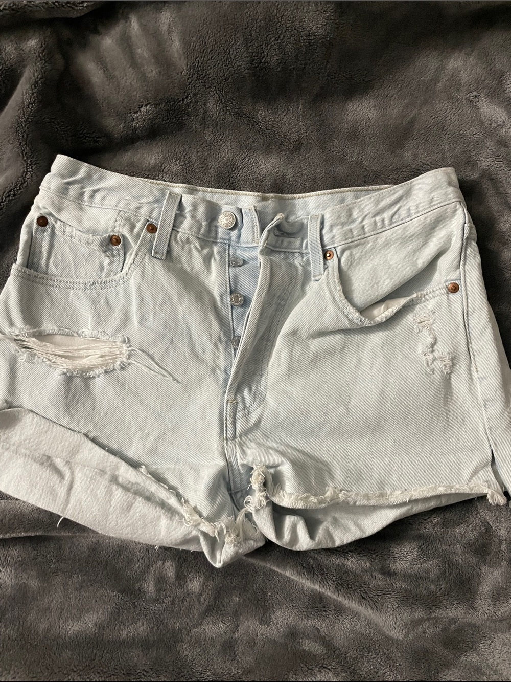 Levi’s 501 High-Waist Light Blue Distressed Denim Shorts